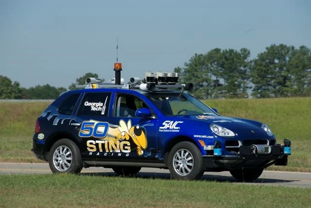 Georgia Tech’s blue Sting 1 Porsche Cayenne with roof-mounted sensors